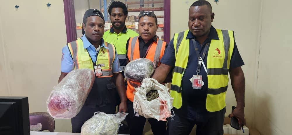 Security officers from the Airport showing the drug that were confiscated.
